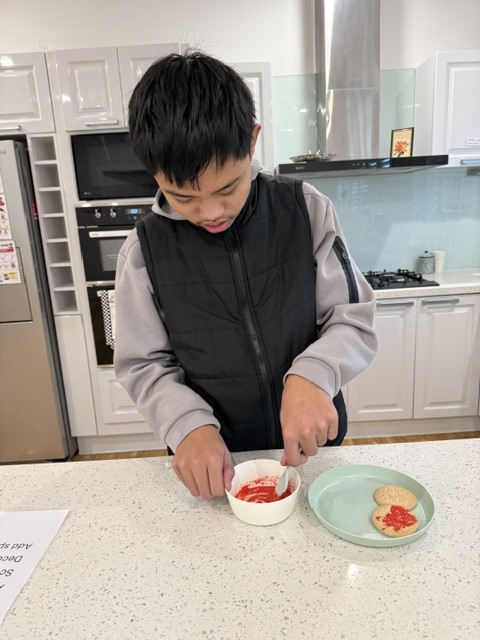 Teen Biscuit Jam Spreading